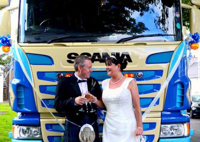 The new Mr & Mrs Alan Gillie in front of their chosen mode of transport, an Oakley Supremacy Scania horsebox.